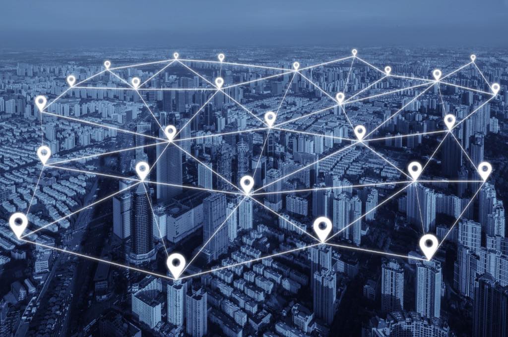 City map with connected location markers representing a distributed customer network